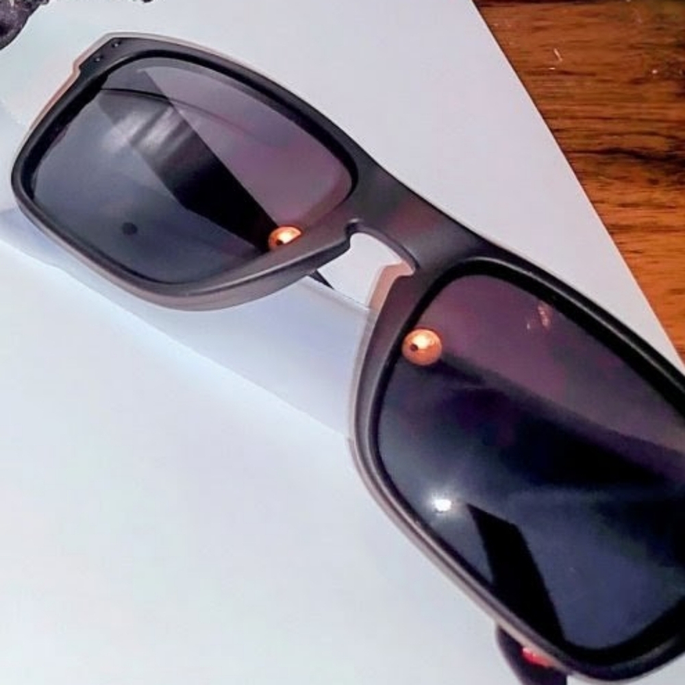 Oakley Sunglasses with Black and Brown Striped Pouch